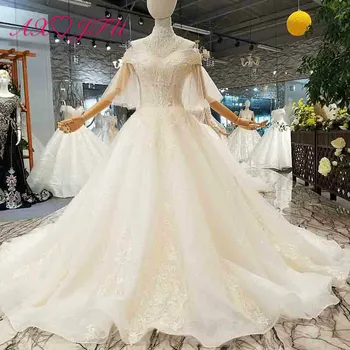 

AXJFU luxury princess beading diamond white flower lace wedding dress vintage handmade boat neck illusion wedding dress 3011
