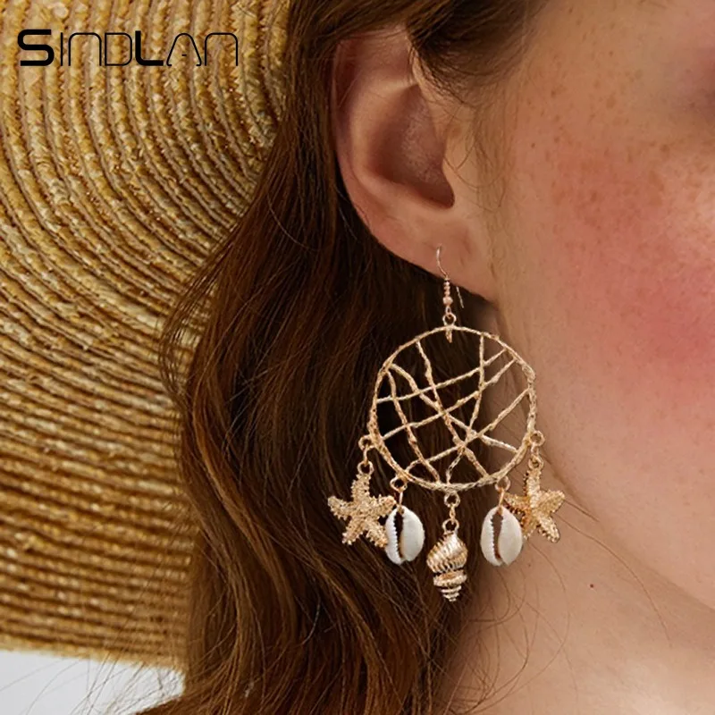 

Sindlan Exaggerated Gold Net Natural Shell Earrings for Women Starfish Coin Lion Head Statement Earrings Dangling Ear Jewelry