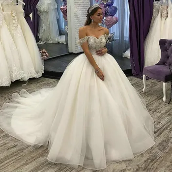 

Luxury Arabic Boho Ball Gown Wedding Dresses Off Shoulder Beaded Crystal Wedding Gowns Tulle Chapel Train Princess Bridal Dress