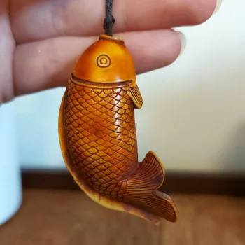 

Lovely 2“ Resin Made Fish Netsuke Pendant with Oriental Images inside