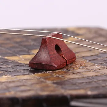 

Red Sandalwood Erhu Counter Bridge Erhu Bridge Industry Erhu Code Master Handmade Bridge Sound Quality Sensitive