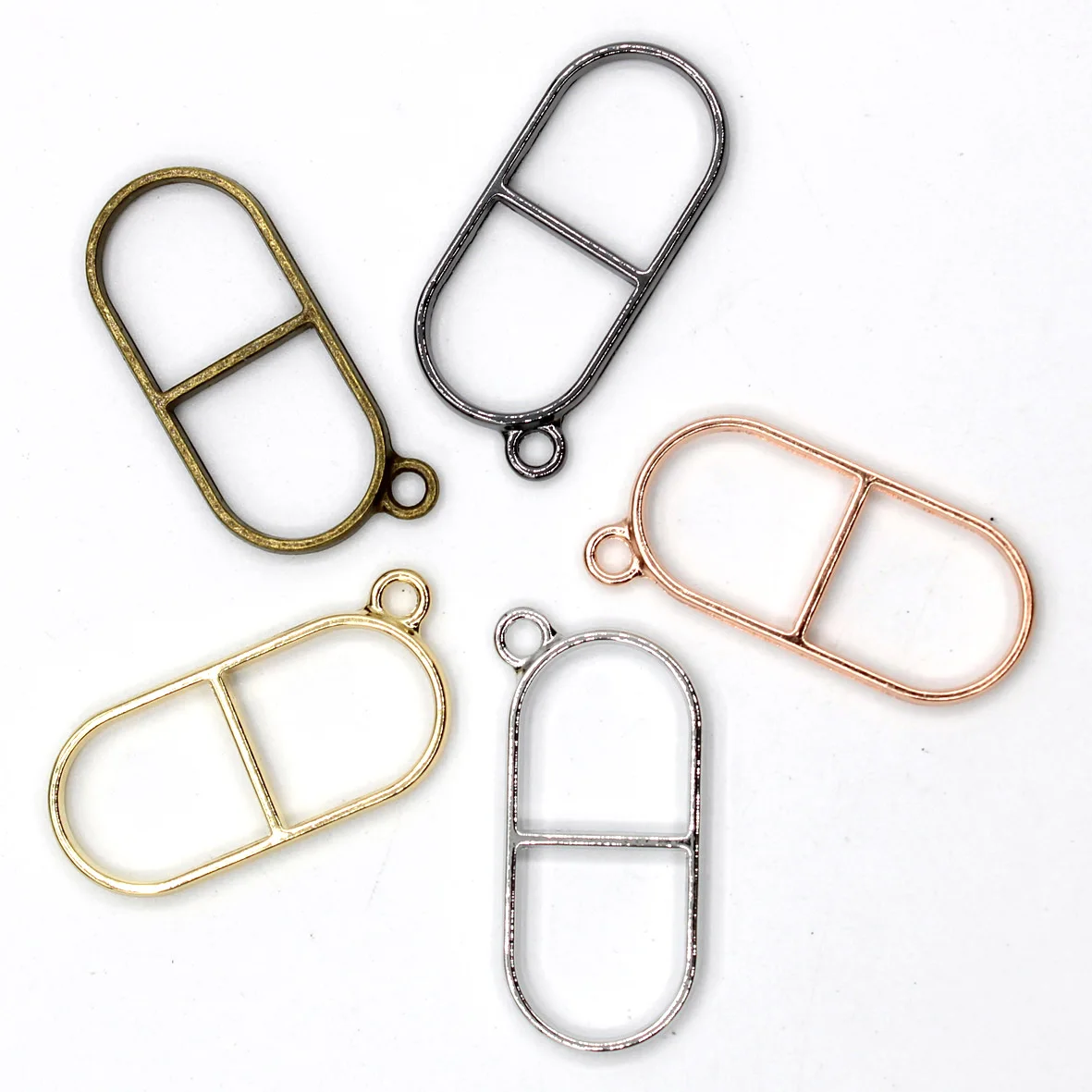 

Metal Hollow Embossed Frame Resin Jewelry Making Frame Necklace Earring Pendant Mould 10pcs/lots Pill Shape 5 Colors