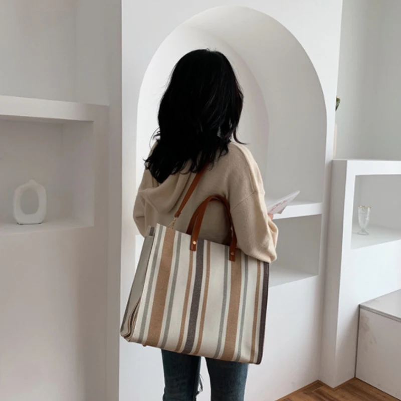 

Advanced custom casual new big bag female new striped canvas shopping bag shoulder bag large capacity ladies popular handbag
