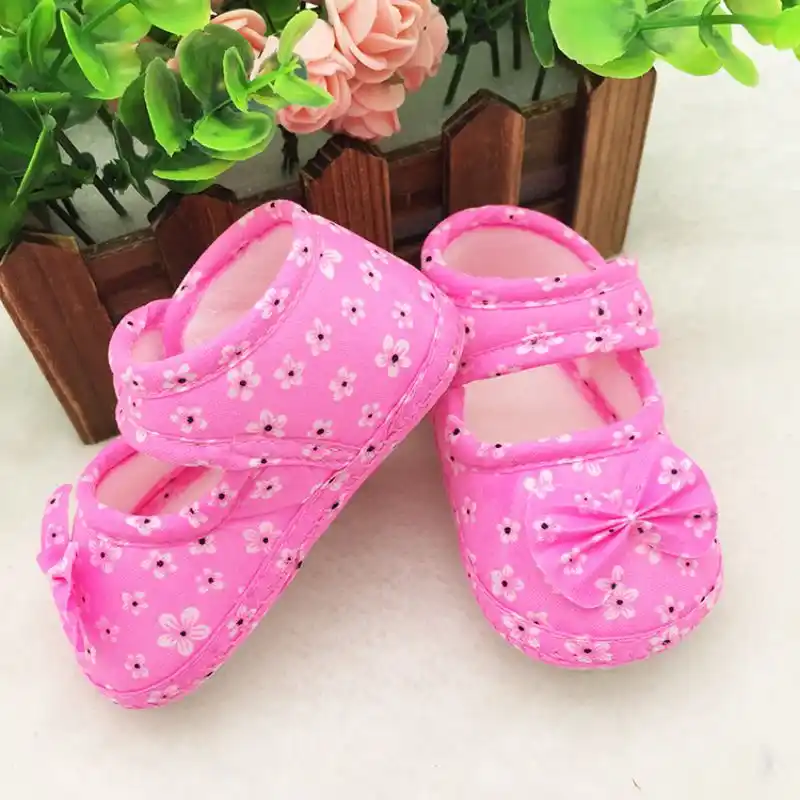 infant girl first walking shoes