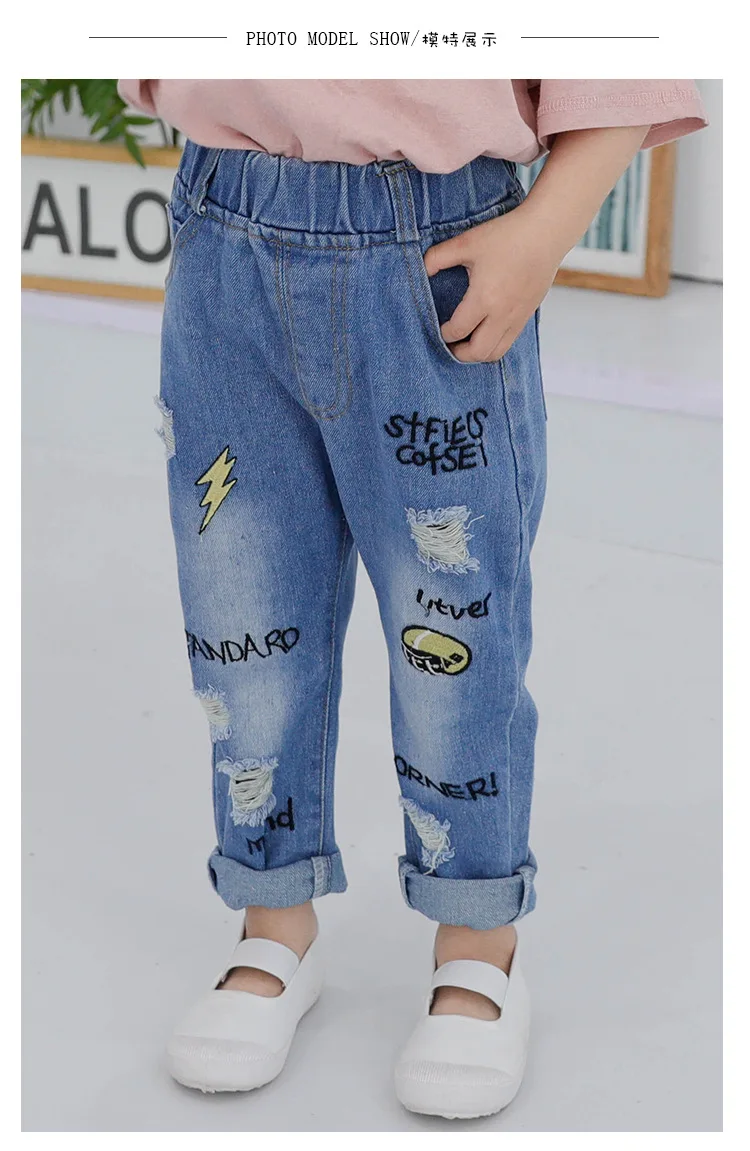 3 quarter ripped jeans