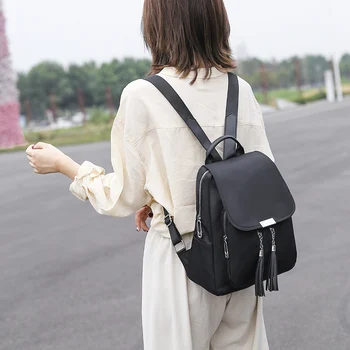 

Hot sale school women travel designer bag Oxford leisure promotional tassel lady backpack light weight backpack for women