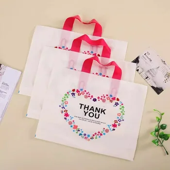 

Big white plastic gift bag custom logo plastic bags and packaging with red handle, plastic candy bag Size 45*41cm+9cm