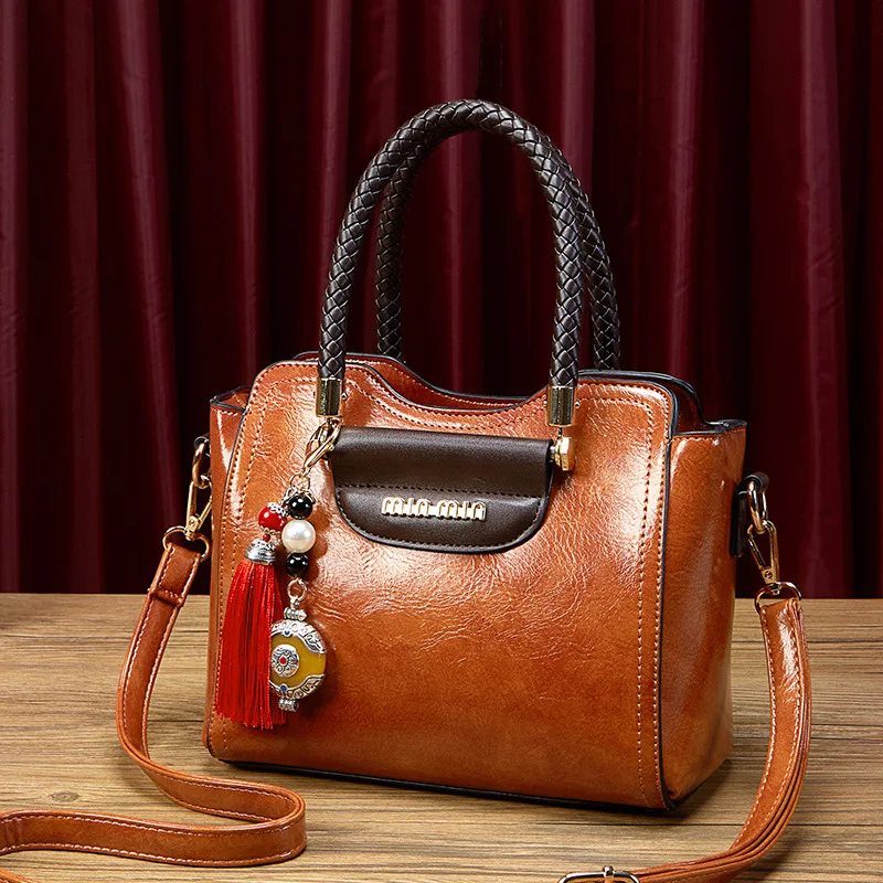 

2020 new simple and wild atmosphere ladies shoulder bag PU leather tote bag square tote bag jade pendant bag