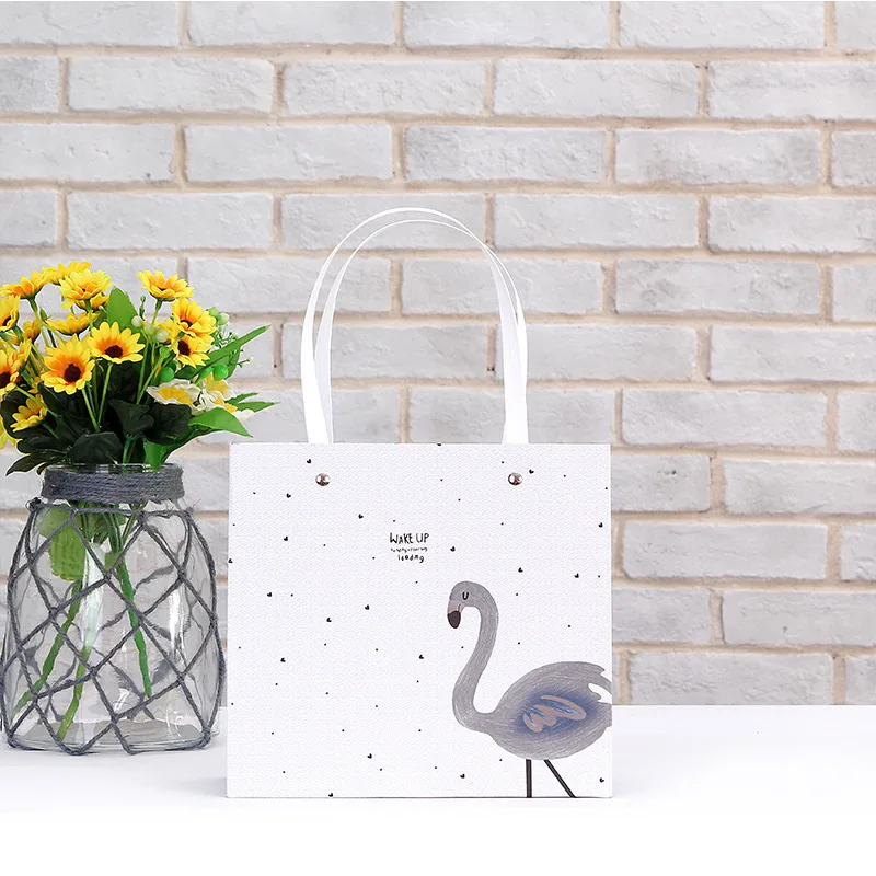 Manufacturers Direct Selling New Style Cartoon Printed Cowhide Gift Bag Clothing Paper Shopping Bag Tote Bag Customizable