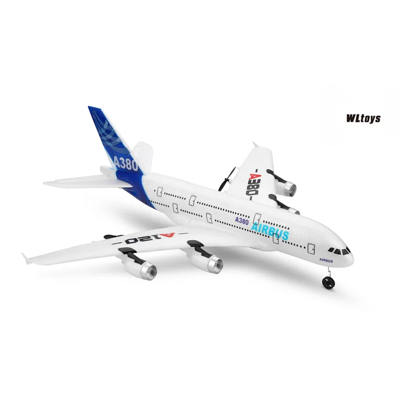 Avion RC télécommandé 2.4G bleu posé au sol, ailes et lumières LED visibles, batterie fournie.
