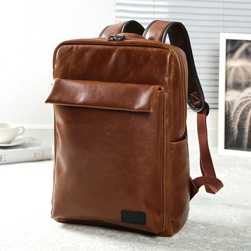 

Simple retro men's backpack trend male backpack student schoolbag trend Korean version of the new leather double shoulder bag