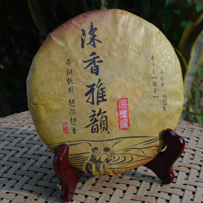 Сделано в 2014 году 200 г Китай Юньнань самый старый спелый чай пух три