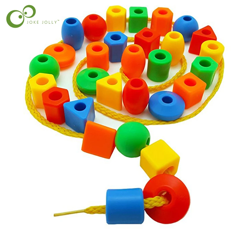 child threading beads