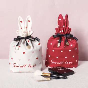

Cute rabbit ins makeup bag small portable female cosmetics receiving bag makeup bag rope bundle pocket