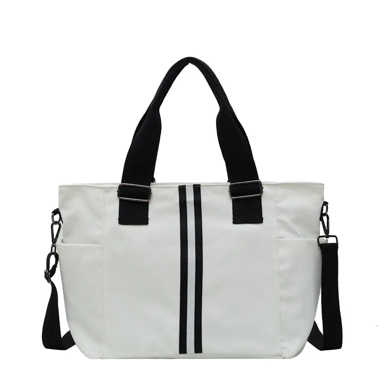 

Canvas Large Capacity Bag Woman 2019 New Korean Version Of Casual Wild Portable Messenger Bag Solid Color Tote Bag High Quality