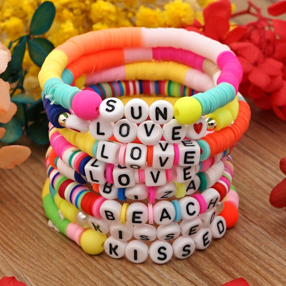 summer-friendship-bracelets-with-letter-beads-on-colourful