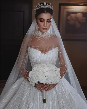 شراءفساتين زفاف فاخرة مزينة بالترتر ورقبة عالية كريستال مطرز المملكة العربية السعودية دبي زي العرائس