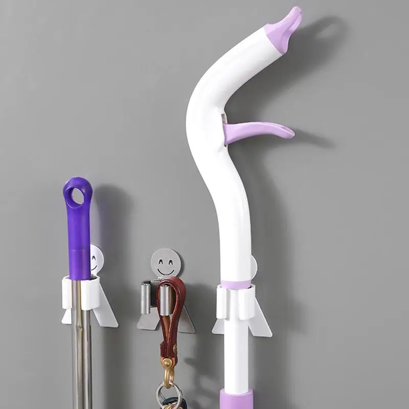 

Powerful and Seamless Mop Clips No Trace Stickers Mop Holder Smile Mop Hanger Hook Powerful Sucker Storage Mop Holder Accessory