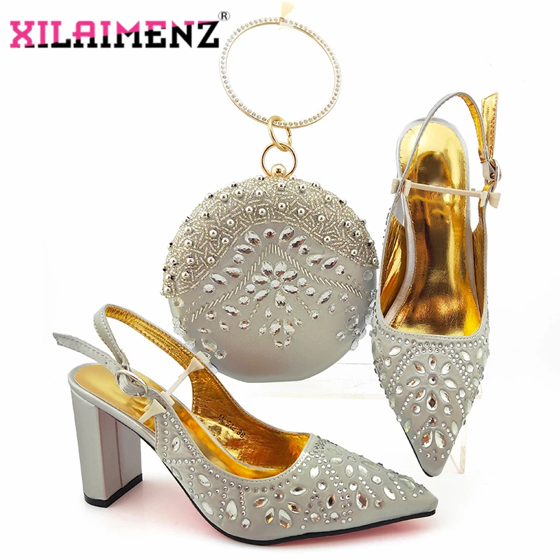 silver sandals and matching bag