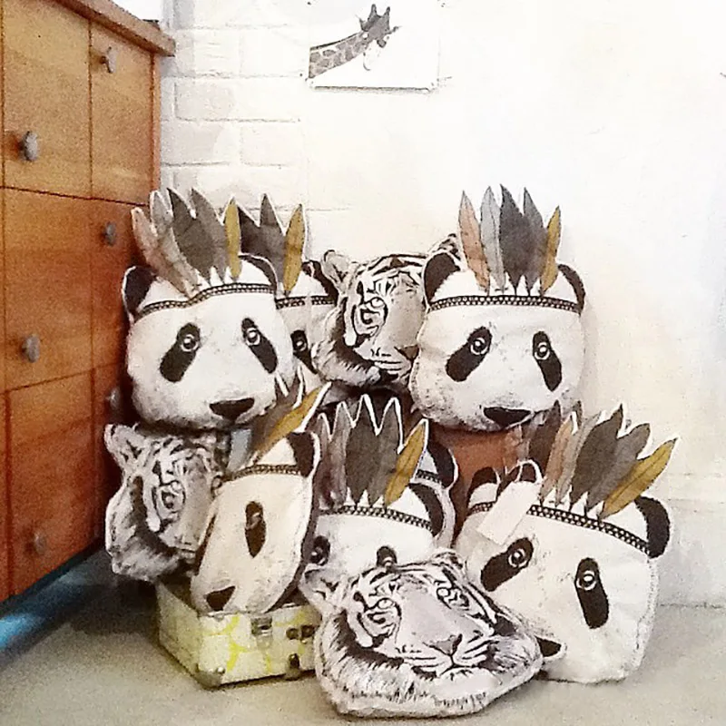 

new international skating panda head doll pillow baby toy children's room stroller stroller decoration
