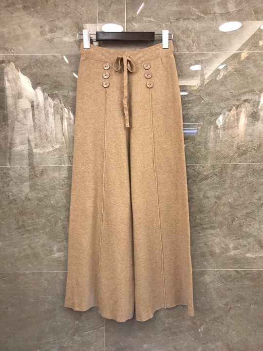 

2019 autumn and winter new women's versatile simple double-breasted net color casual pants 911