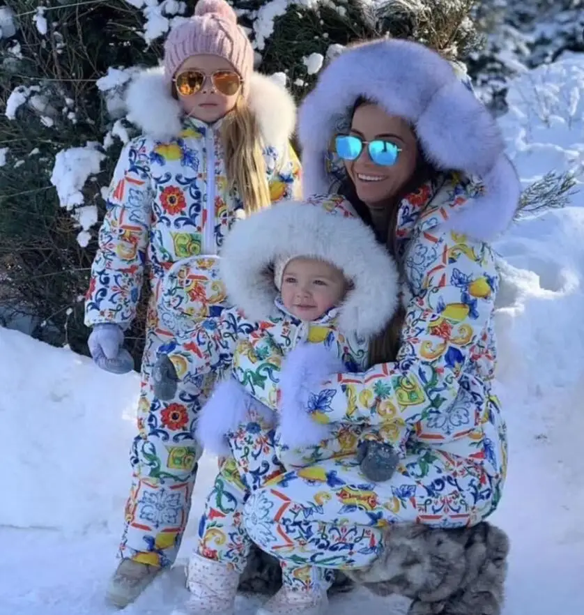 

Family sets 2018 winter Outwear suit Family set mother and child raccoon fur hooded jumpsuit Women down suits outdoor ski suit