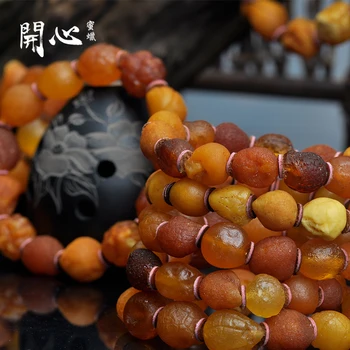 

Baltic natural amber with honey hand string