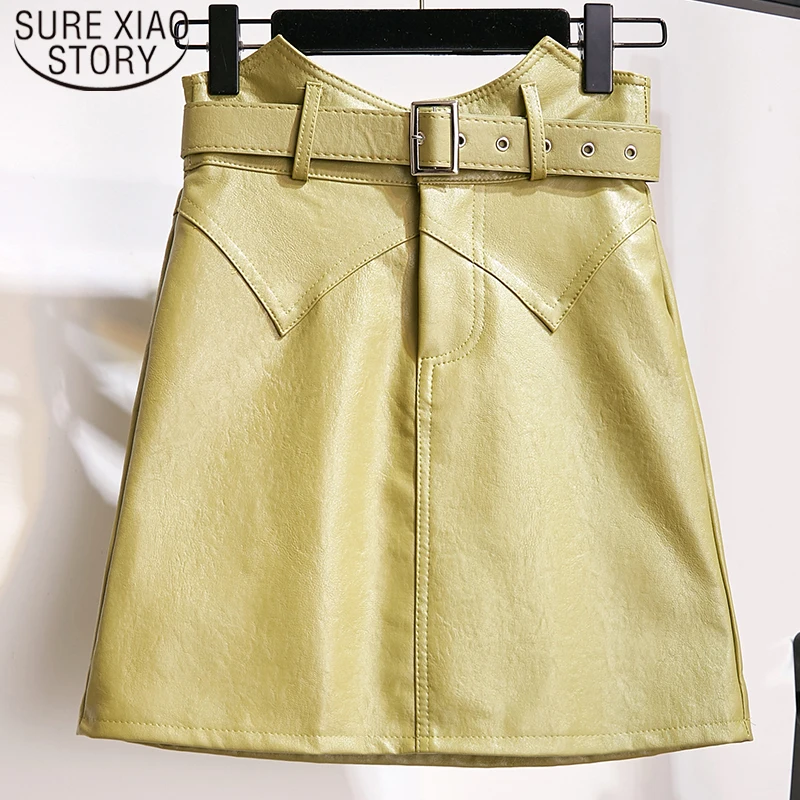 Новинка, трапециевидная короткая зеленая юбка, Осень-зима, асимметричная, высокая талия, элегантная женская юбка из искусственной кожи, Женская мини юбка для офиса 7482 50
