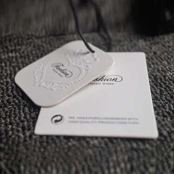 

Factory direct cheap embossed linen finished paperboard hang tags
