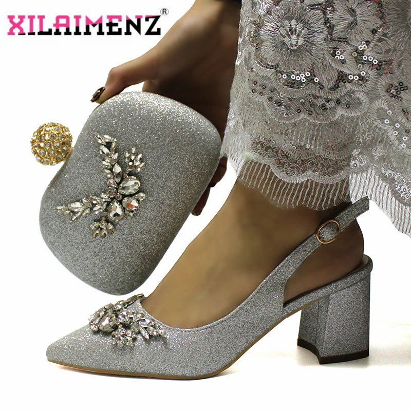 silver heels and bag