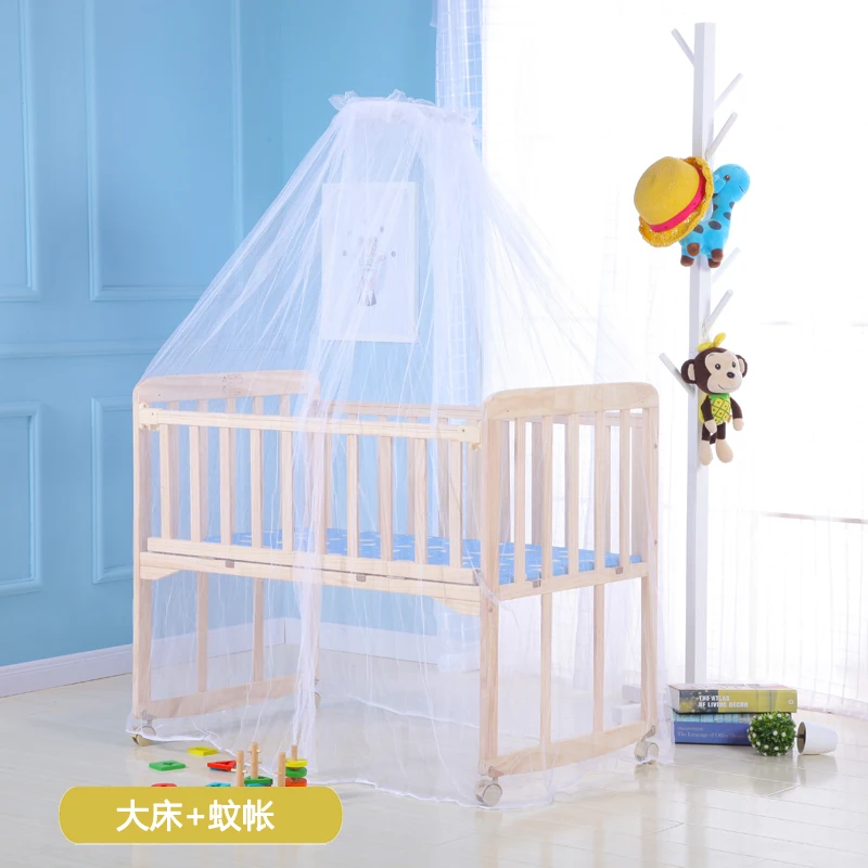wooden cot with mosquito net