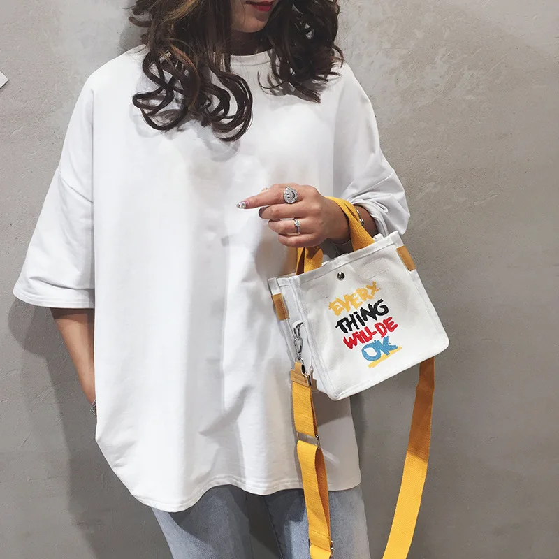 

2019 New Canvas leisure letters in the water bucket bag a mini-shoulder diagonal female bag package