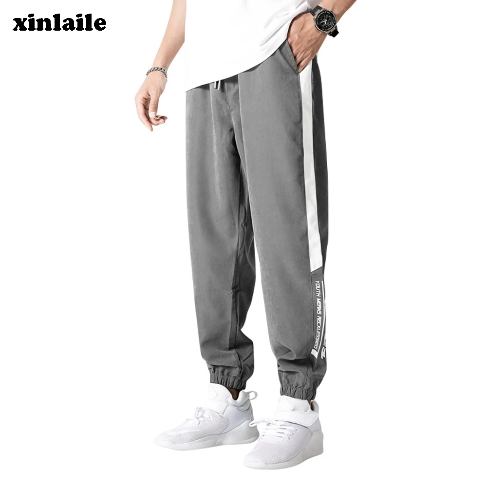 

Jogger men's harem pants Harajuku fitness sports pants spring and autumn men's nine-point pants casual street big fat clothes