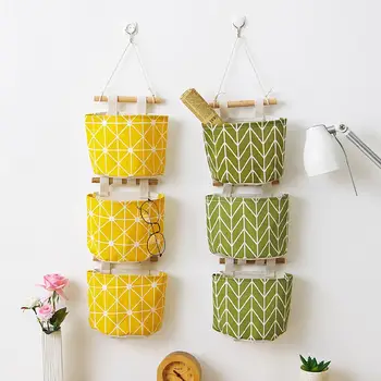 

The cotton and linen waterproof storage bag behind the fabric door can be multi-layer hanging bag to organize the debris bag