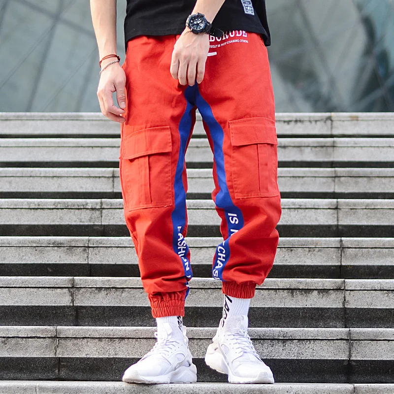 Модные уличные большие карманы соединены Мужские джинсы брюки карго письмо напечатано свободно подходят лодыжки бантами хип хоп брюки джинсы