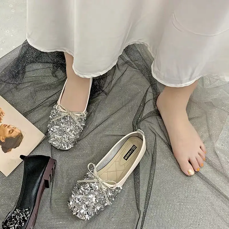 

Factory direct network red sequins female 2019 autumn new wild bow one foot peas shoes shallow mouth single shoes