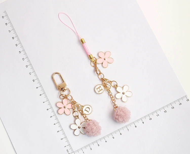 

Style and Japanese Style Cherry Blossom Hollow Bell Mobile Phone Charm Wrist Strap Handbag Pendant Creative Girl's Heart Gift