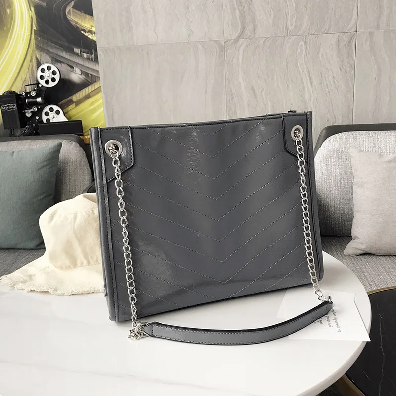 

Summer 2019 New Single Shoulder Tote Bag Fashion 100 sets of large capacity soft leather chain ladies bag leisure trend