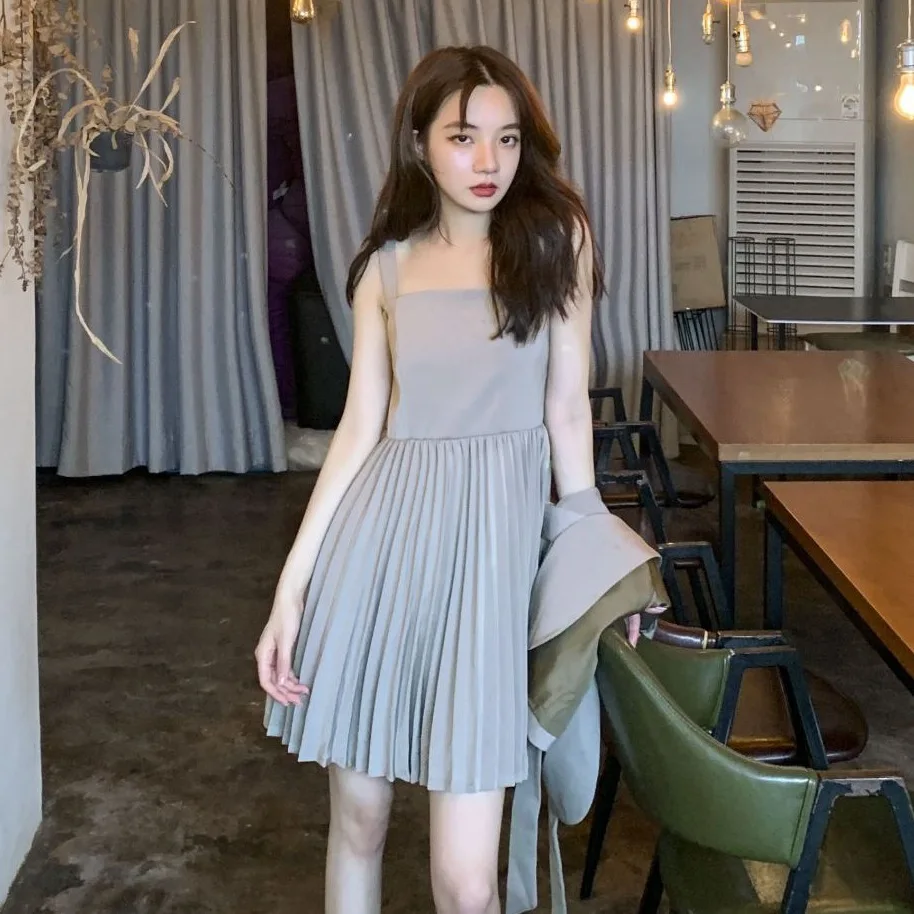 

Photo Shoot INS Non-mainstream Apricot Camisole Pleated Dress Double Breasted Waist Hugging Lace-up Ol Suit Two-Piece Set Women'
