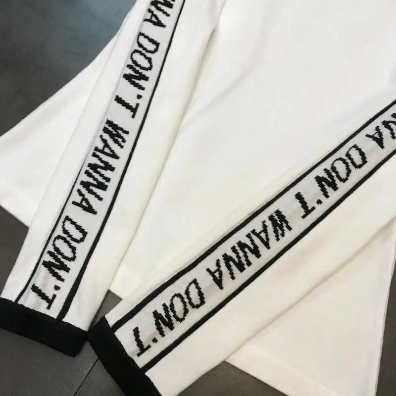 autumn new shoulder sleeves side letters black and white contrast color round neck long-sleeved knit sweater women