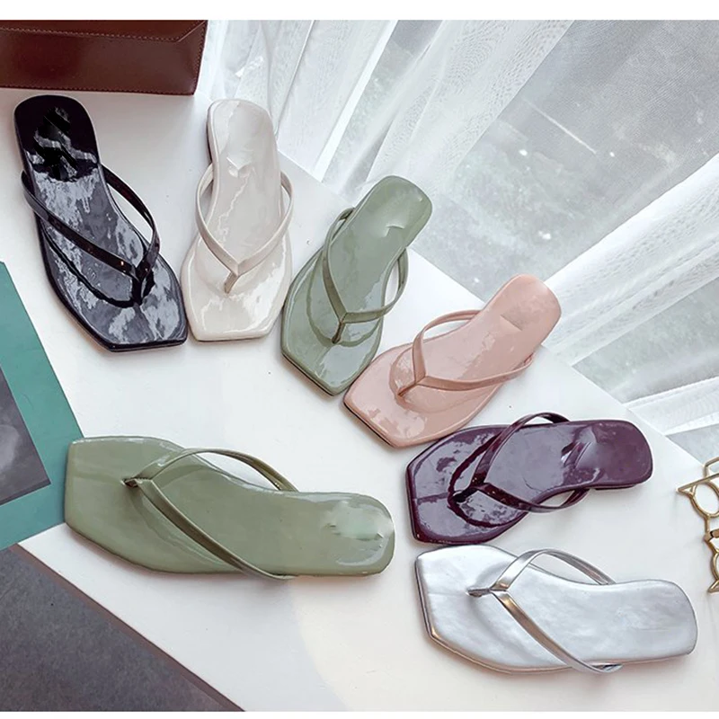 

Korean version of new East Gate flat heel flat bottom with flip flops for women's antiskid leisure fashion beach sandals