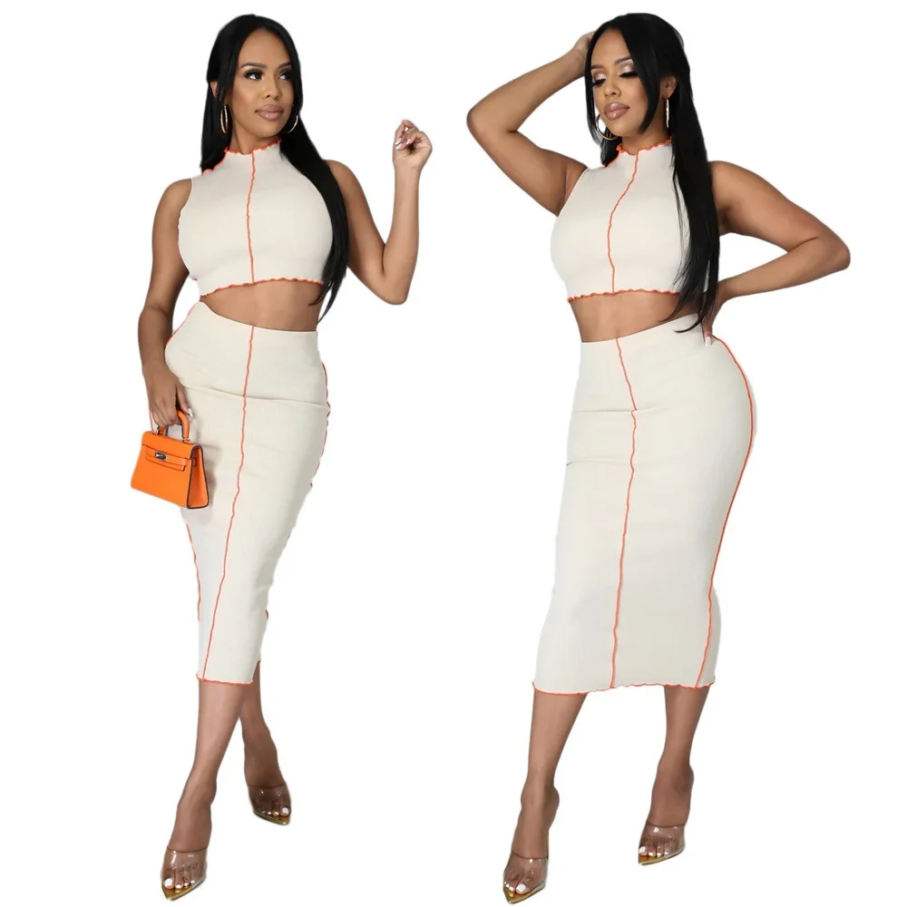 2021 The New Summer Knit Skirt Suit Ladies Leisure Blouse + Half Skirt Two Sets Of Europe The United States Sexy Buttock Skirt