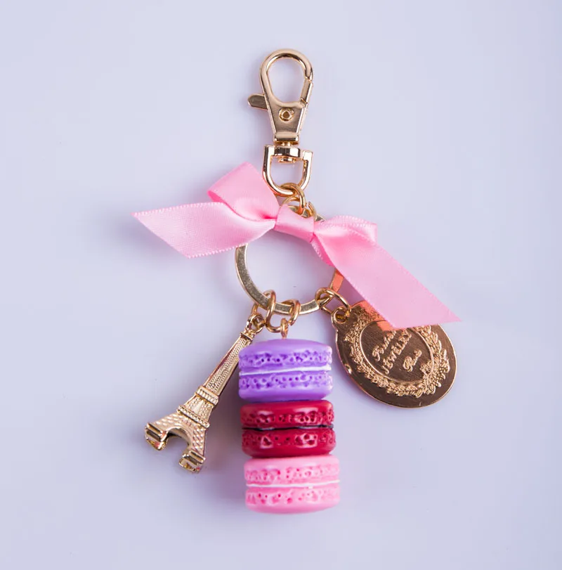 Comprar Llaveros con colgante de la Torre Eiffel Macaron para mujeres y niñas mochila con lazo de aleación de color dorado con llavero de coche con llavero con caja de regalo