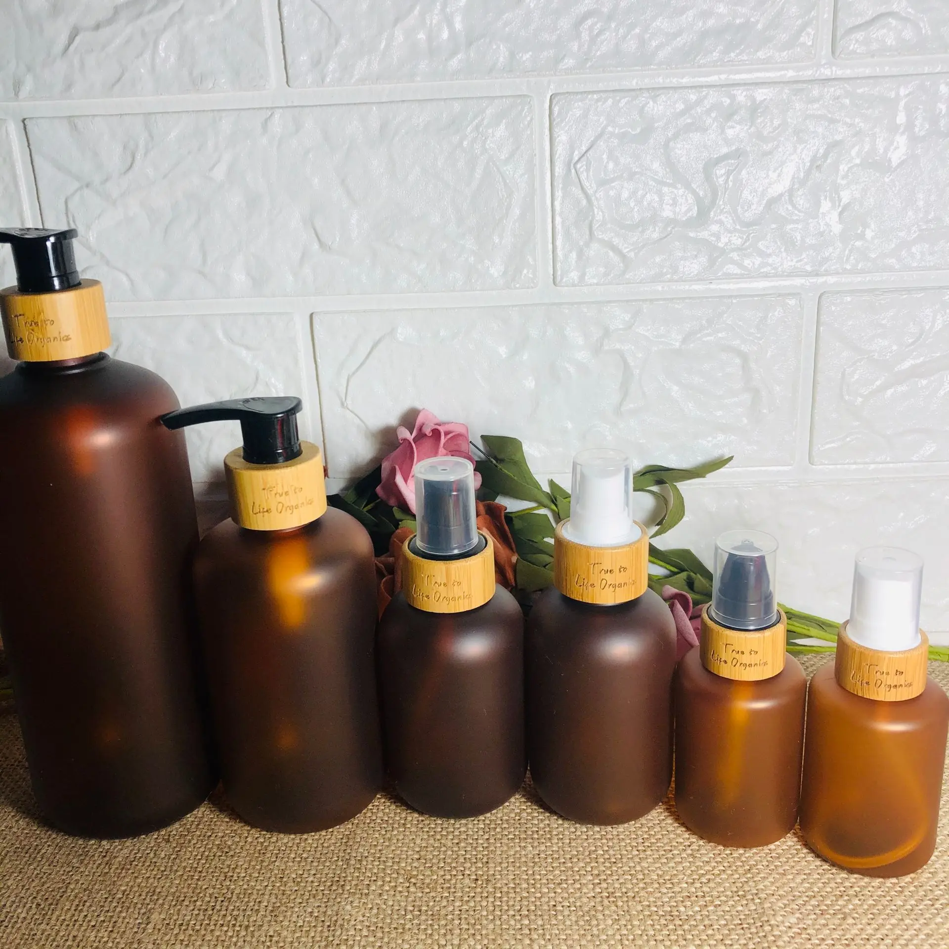 Wholesale Custom Cosmetic Packaging Amber Plastic PET Tonner Spray Pump Bottles With Bamboo Lid Cap For Shampoo, Lotions, Liquid