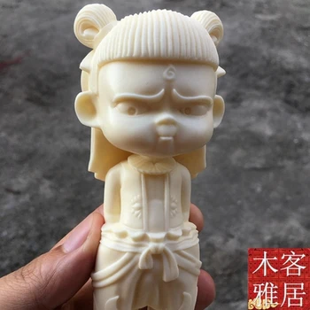 

Ivory Fruit Carving Cute Demon Boy Creative Handicraft Arrangements