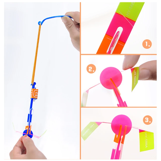 10PCS Outdoor Slingshot Toys Shining Rocket Flash LED Light Night Kids Shine Slingshot Elastic Helicopter Rotating Toy 4