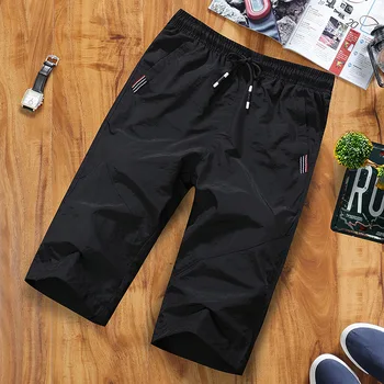 

Men Shorts Summer Seven Points Pants Leisure Beach Pants Sports Loose Big Code Speed Dry Pants Tide Male Middle Pants 5 Points