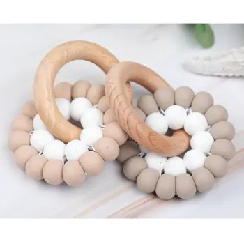 

Baby Teether Bracelet Ring Boy Girl Beech Wooden Teething Rattle Toy Shower Gift H55B
