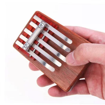 

Mini 5 Tone Mahogany Thumb Piano Card Lymphatic CHILDREN 'S Toy Kalimba-