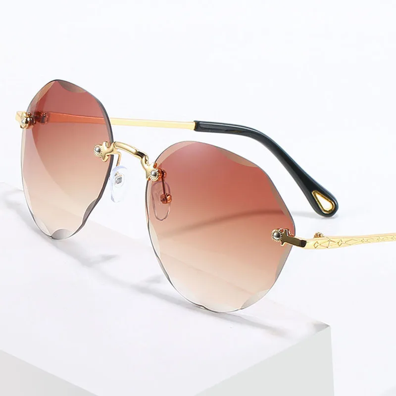 

Fashion Rimless Sunglasses Women Round Sun glasses Luxury Brand Female Metal Shades UV400 Eyewear oculos de sol